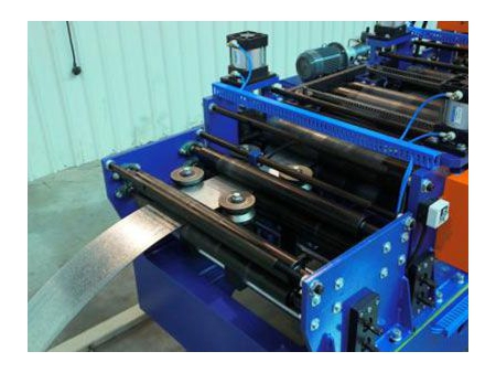 Perfiladora con cambio de correa automático