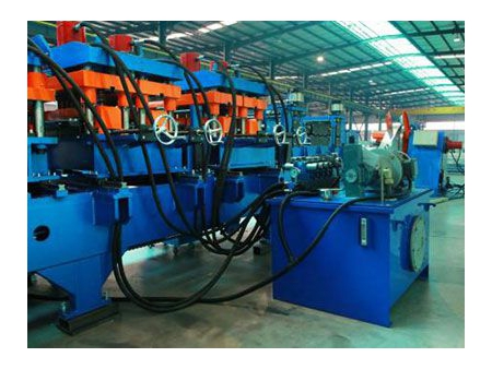Perfiladora con cambio de correa automático
