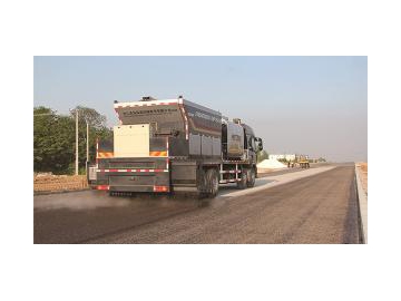 Distribuidor y equipo esparcidor de sello sincronizado