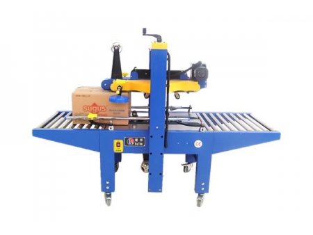 Máquina selladora de cajas y paquetes