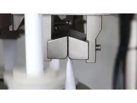 Llenadora y selladora automática de tubos